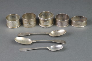 Five silver napkin rings and 3 teaspoons 218 grams