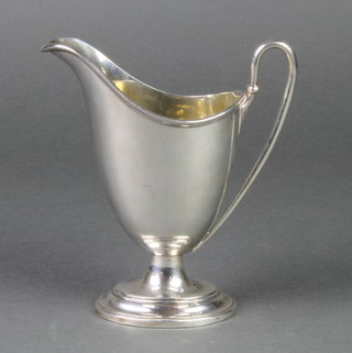 A silver helmet shaped cream jug, Sheffield 1928 142 grams