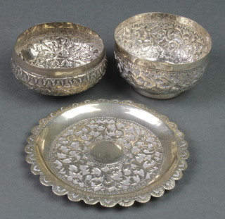 A Persian silver dish and 2 ditto bowls decorated with flowers, 128 grams