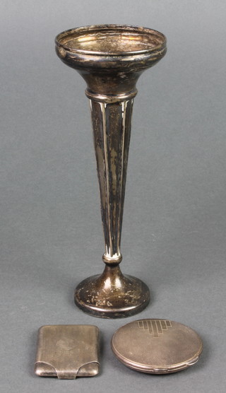 A silver tapered posy vase, Birmingham 1924, 8", a silver match sleeve and a compact