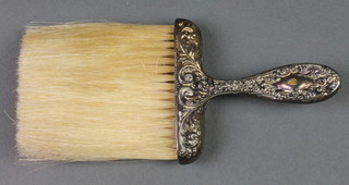 AN Edwardian repousse silver brush, import marks, Chester 1902 
