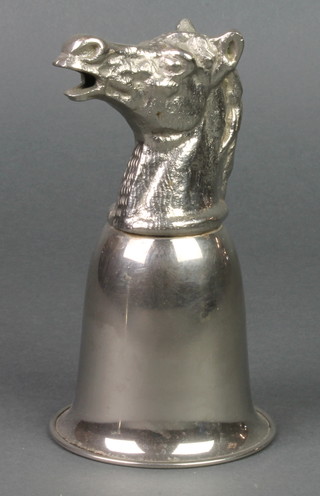 A silver plated stirrup cup in the form of a horses head 