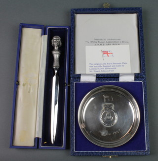 A silver commemorative dish, cased, a ditto silver handled paper knife 