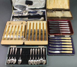 A cased set of 6 butter knives with fancy handles and 5 other plated cased sets 