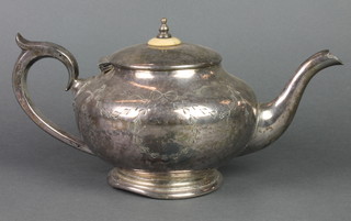 An Edwardian silver plated bulbous teapot with ivory mount