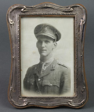 A silver repousse rectangular photograph frame, Birmingham 1918 6 1/2" x 5" 