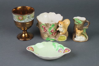 A Victorian lustre beaker, 2 fauna vases and a Carltonware dish
