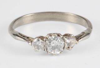A white gold 3 stone diamond ring, size L 1/2