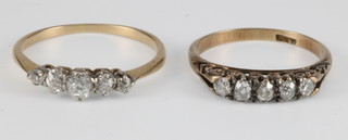 2 18ct diamond set rings, size L and O
