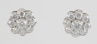 A pair of 18ct white gold 9 stone diamond ear studs, approx 2.45ct 