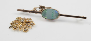 An Edwardian 9ct gold opal bar brooch, a gold pearl set pendant