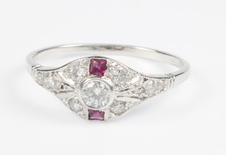 An 18ct white gold ruby and diamond Art Deco style ring, size N