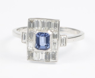 An 18ct white gold sapphire and diamond Art Deco style up finger ring, size O 1/2