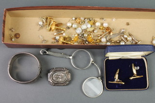 A silver hollow bangle and minor costume jewellery