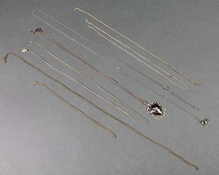 A Thai silver pendant and chains