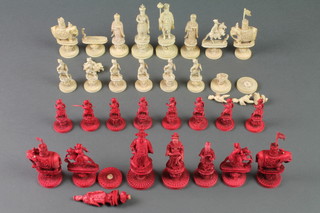 A late 19th Century carved and stained Cantonese ivory chess set, the king 4 1/4" 