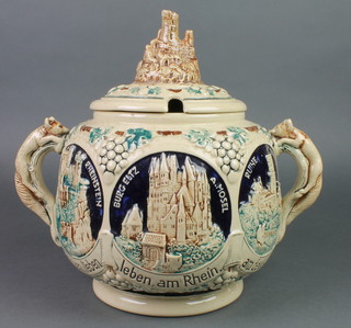 A German ceramic tureen and lid with city views and fox handles, 12"
