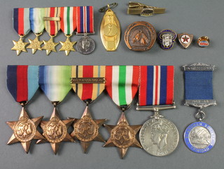 A Second World War group 1939-45 Atlantic Africa with North Africa bar and Italy Star war medal together with miniatures and minor badges 