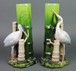 A pair of Bretby jardinieres in the form of herons beside bamboo 11 1/2" 