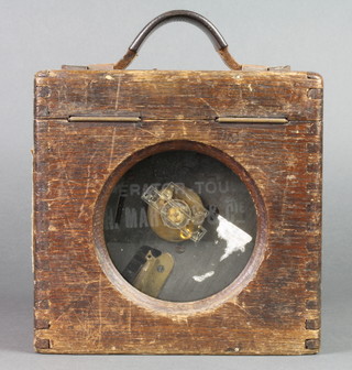 A racing pigeon clock contained in an oak case 