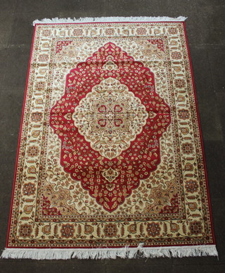 A red and white ground Belgian cotton rug with central medallion 90" x 63" 