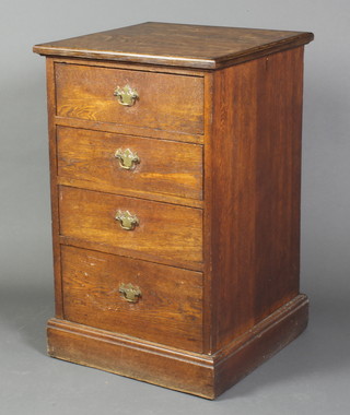 An oak pedestal chest of 4 long drawers with brass swan neck drop handles, raised on a platform base 31"h x 19"w x 19"d 