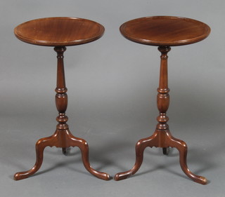 A pair of Georgian style mahogany wine tables, raised on pillar and tripod bases 20 1/2"h x 12" diam. 