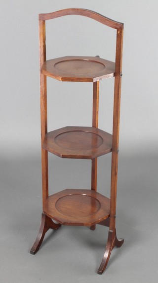 An Art Deco octagonal mahogany 3 tier folding cake stand 34"h x 9 1/2" x 9 1/2" 