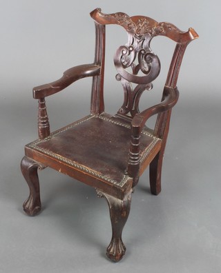 An Edwardian Chippendale style mahogany child's carver chair with vase shaped slat back and upholstered seat, raised on cabriole, ball and claw supports 