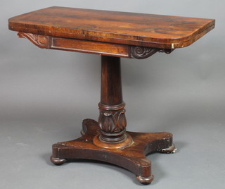 A William IV mahogany D shaped card table raised on a turned column and triform base and bun feet 29"h x 36"w x 18"d 
