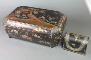 A Victorian arch shaped black lacquered trinket box with hinged lid and mother of pearl inlay 11"h x 6 1/2"w x 10"d, together with a Victorian black lacquered lozenge shaped sewing box with hinged lid decorated a peacock 7"h x 18"w x 12"d