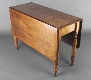A Victorian mahogany drop flap table, raised on 4 turned supports 27"h x 38"w x 16" when closed x 48" when open