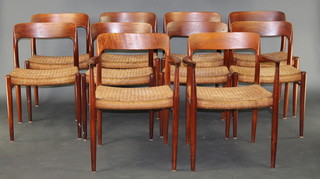 In the manner of K Moller, a set of 10 1960's teak bar back dining chairs with woven rush seats comprising 2 carvers and 8 standard 

