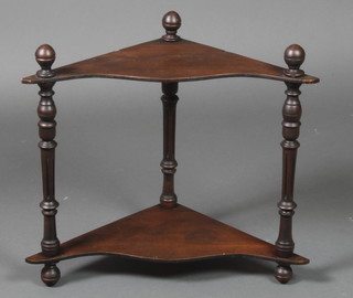 A Victorian mahogany 2 tier hanging corner what-not 15"h x 19" x 10" with later plywood shelves