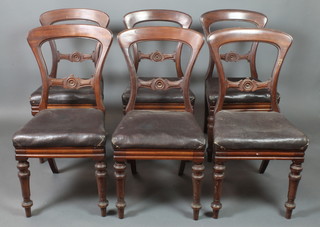 A set of 6 Victorian mahogany buck back dining chairs with carved mid rails and drop in seats on turned supports