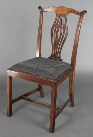 A Georgian mahogany Chippendale style slat back dining chair with upholstered drop in seat raised on square tapering supports with H framed stretcher 