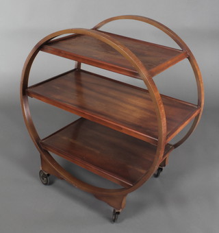 An Art Deco circular mahogany 3 tier tea trolley with 3 graduated trays, 31"h x 20 1/2"w x 17"d  