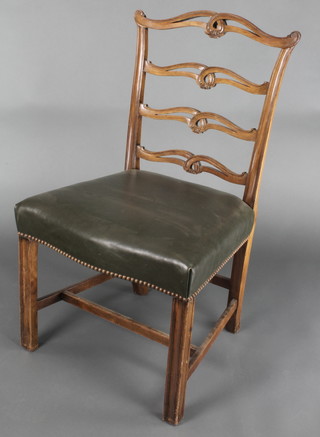 A Georgian style mahogany London ladderback chair with upholstered seat of serpentine outline, raised on square tapering supports with H framed stretcher
