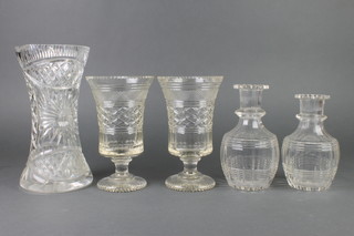 A pair of cut glass celery vases 8", 2 decanters lacking stoppers and a waisted vase 