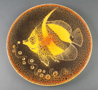 A Poole orange ground dish decorated with a fish 5 14" 