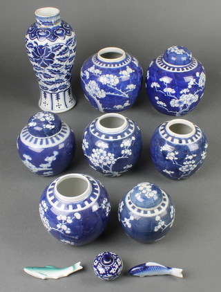 7 blue and white prunus ginger jars, 3 with covers, an oviform vase, a lidded pot, 2 fish knife rests 