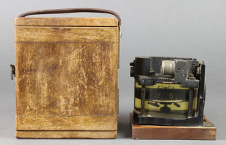 An aircraft compass contained in a carrying case 