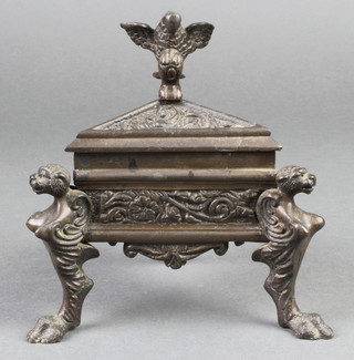 An 18th/19th Century bronze triangular shaped censer raised on 4 stylised griffin supports and with eagle finial 5 1/2" 