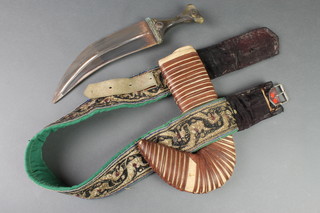 A Janbiya with 8 1/2" blade and horn handle, complete with scabbard and belt 