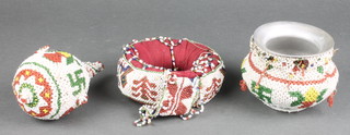 A "Zulu" bead work bangle 4 1/2", an aluminium and bead work covered bowl 3", a club shaped item decorated a gourd 5" 