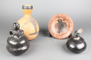 A carved gourd vase 8", a circular pottery bowl decorated a turtle 6 1/2", pottery flask and a pottery jar and cover 4" 
