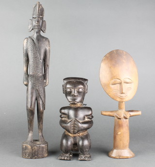 3 African carved figures of standing warriors 16", 12" and  9"