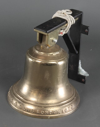 A Warner & Sons Bell London, dated 1871, 13" diam. complete with iron clapper and later cradle 