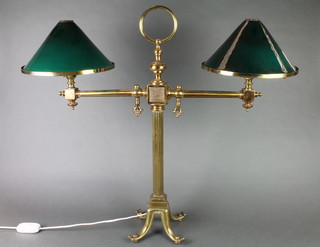 A Victorian style brass twin light library lamp with reeded column and green glass shades 27" 