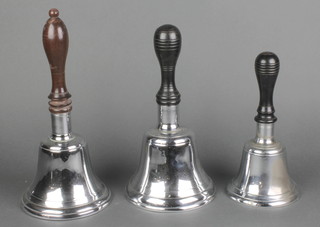 3 graduated chrome hand bells with turned wooden handles 